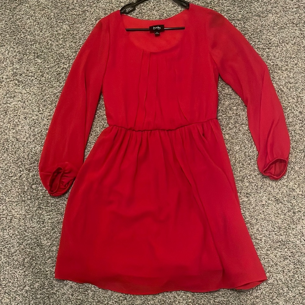 This is a red, cuffed, By & By branded dress. Size medium.